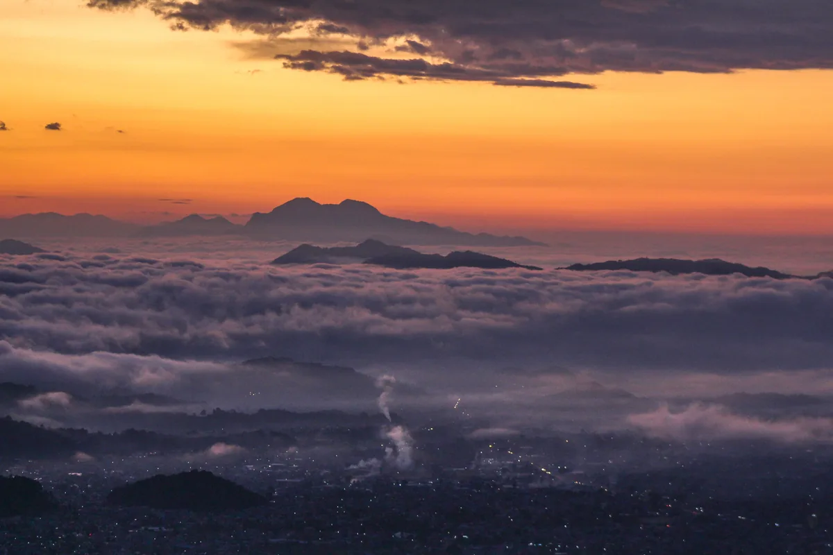 Sunset over a sea of clouds in the Kathmandu valley, Nepal